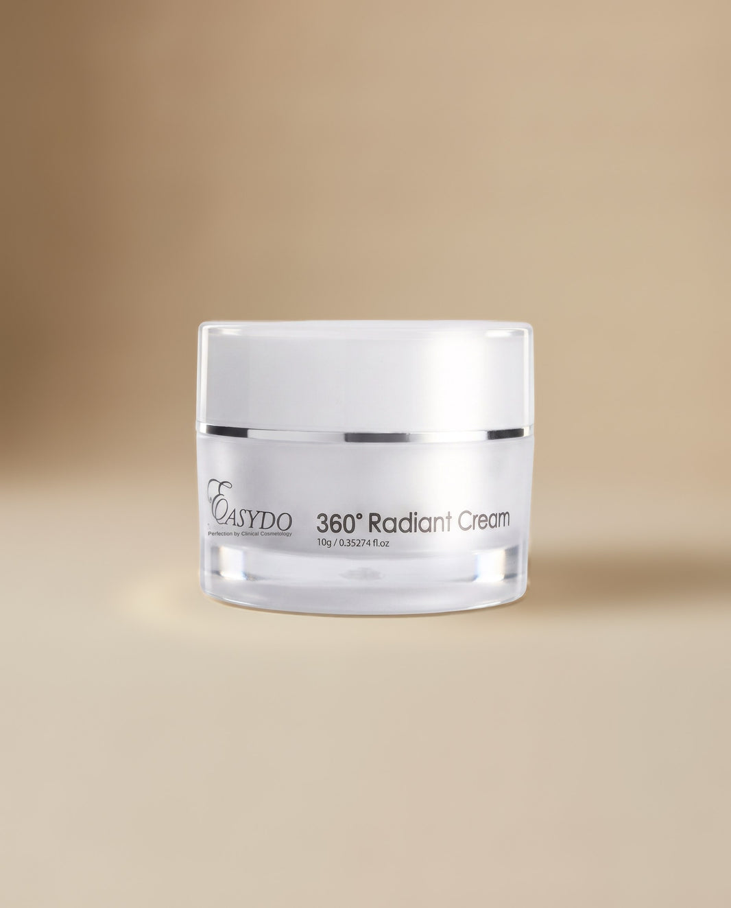 A clear cosmetic jar of Easydo 360° Radiant Cream with a white lid, set against a warm beige gradient background.